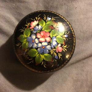 small round trinket box with flowers